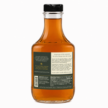 Load image into Gallery viewer, Bottle of syrup with a label on a white background