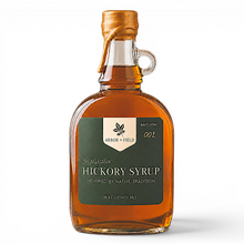 Load image into Gallery viewer, Shagbark Hickory Syrup 16 oz growler bottle with green and cream Arbor and Field Label on the front, a gold wax dipped cap and a handwritten gold batch number. Clean white background, premium look and feel.