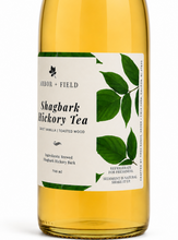 Load image into Gallery viewer, Bottle of Shagbark Hickory Tea with a label featuring green leaves on a white background
